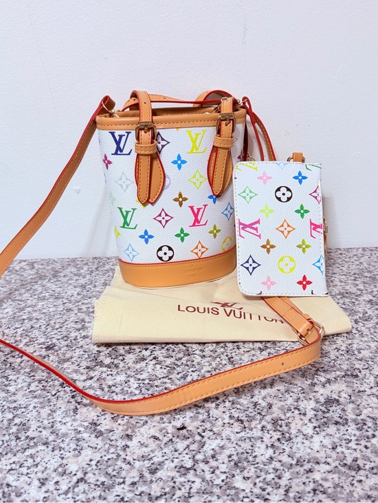 Louis Vuitton Handbags - Louis Vuitton Multicolor Monogram White Canvas Bucket Crossbody with Tan Trim